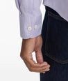 Model is wearing UNTUCKit Lilac Gingham Wrinkle-Free Cadetto Shirt.