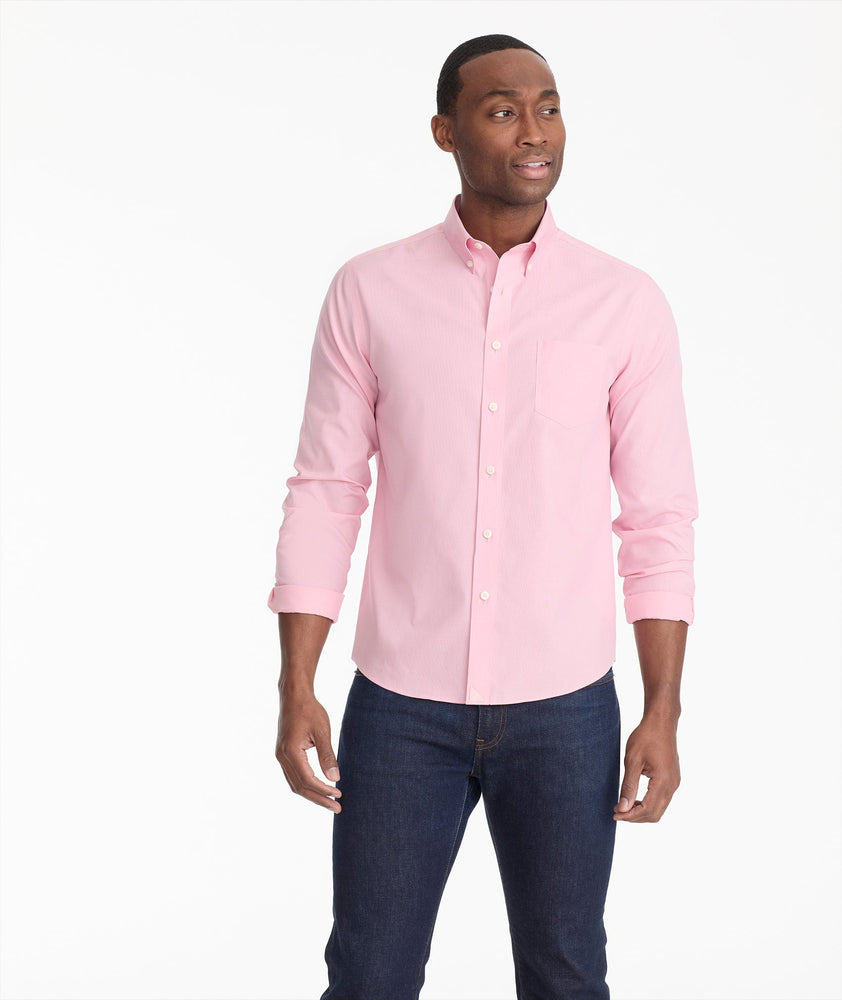 Model is wearing UNTUCKit cadetto wrinkle-free gingham shirt is berry.