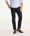 Model is wearing 5-Pocket Chino Pants in black.