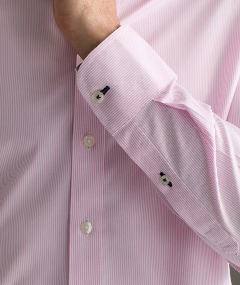 Model is wearing UNTUCKit Douro wrinkle-free shirt.