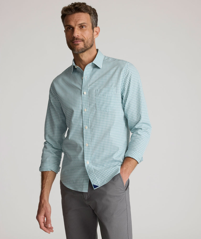 Model is wearing UNTUCKit Lawrence wrinkle-free shirt.