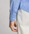 Model is wearing Marlowe performance shirt.
