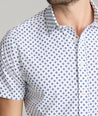 Model is wearing UNTUCKit Tidwell performance shirt.