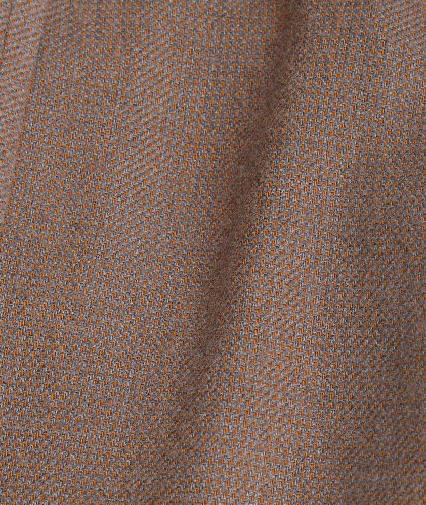 Model is wearing UNTUCKit Veneto wrinkle-free shirt.