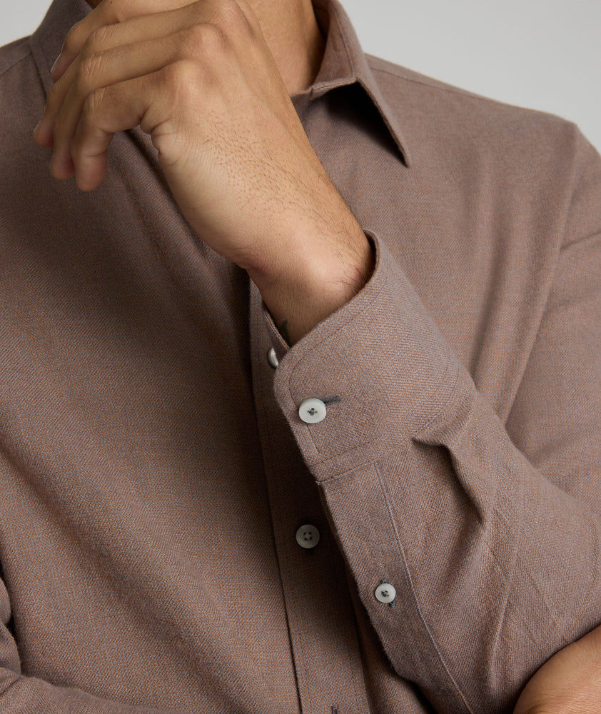 Model is wearing UNTUCKit Veneto wrinkle-free shirt.