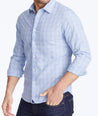 Model wearing a Blue Wrinkle-Free Basano Shirt