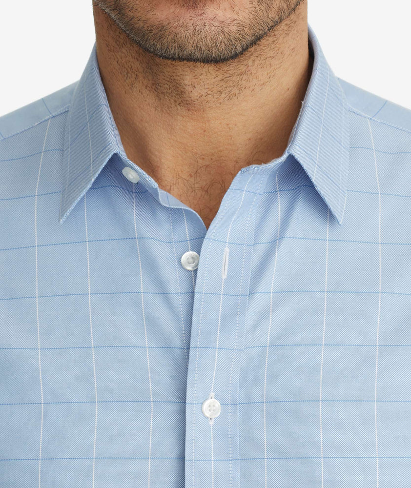 Model wearing a Blue Wrinkle-Free Blakeslee Shirt