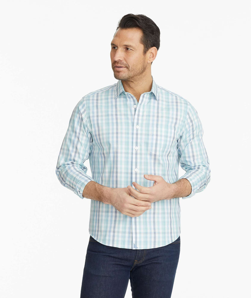 Model wearing a Navy Wrinkle-Free Castano Shirt