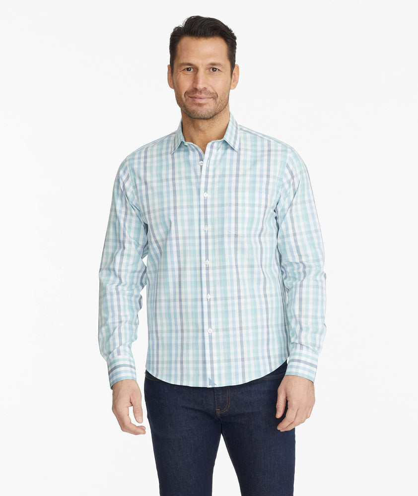 Model wearing a Navy Wrinkle-Free Castano Shirt