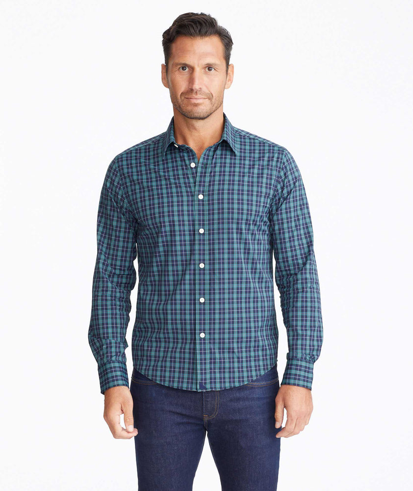 Model wearing a Green Wrinkle-Free Performance Gangard Shirt