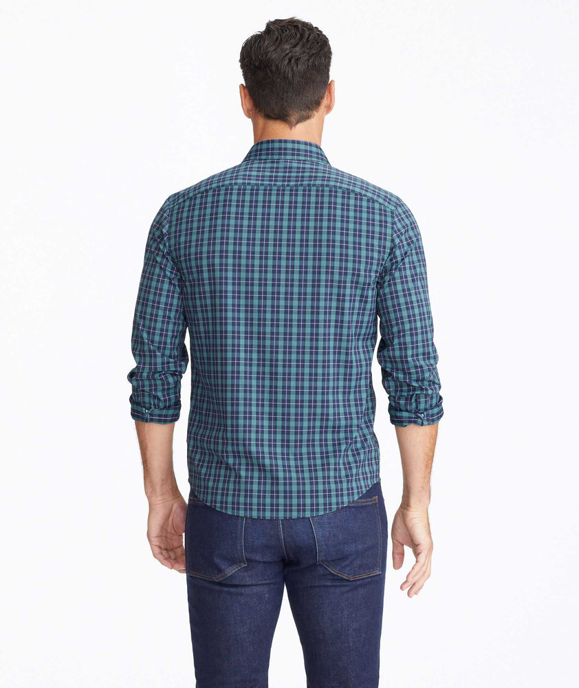 Model wearing a Green Wrinkle-Free Performance Gangard Shirt