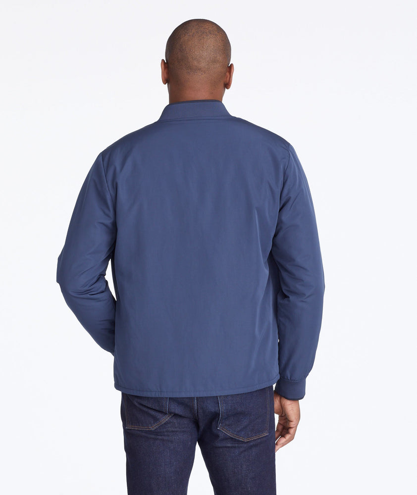 Model wearing a Navy Bomber Jacket