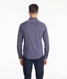 Model weating a Black Wrinkle-Free Performance Martinet Shirt