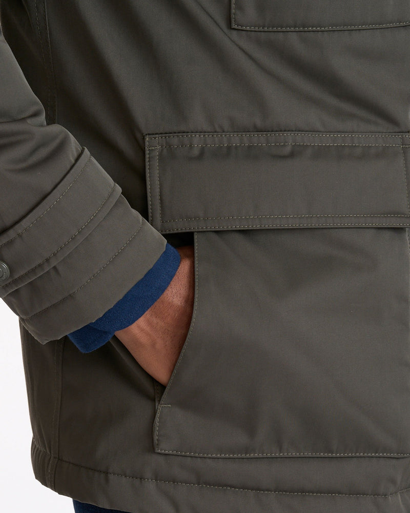 Model wearing a Grey Water-Repellent Utility Jacket