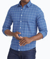 Model wearing a Blue Wrinkle-Free Performance Flannel Shirt