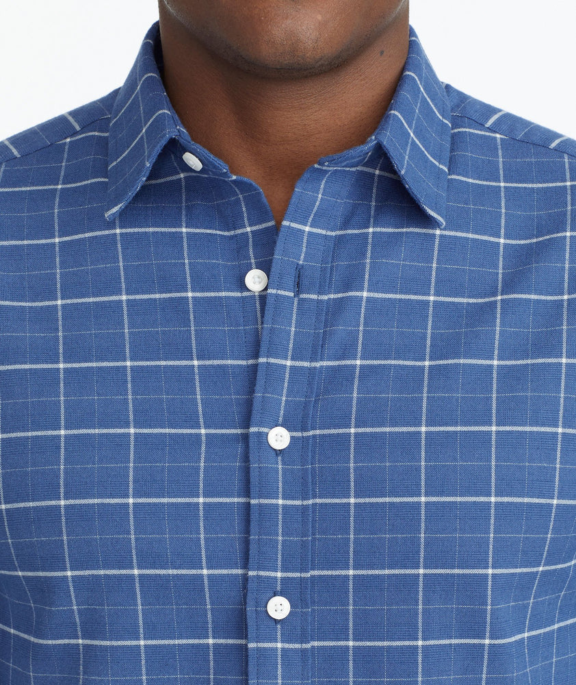 Model wearing a Blue Wrinkle-Free Performance Flannel Shirt