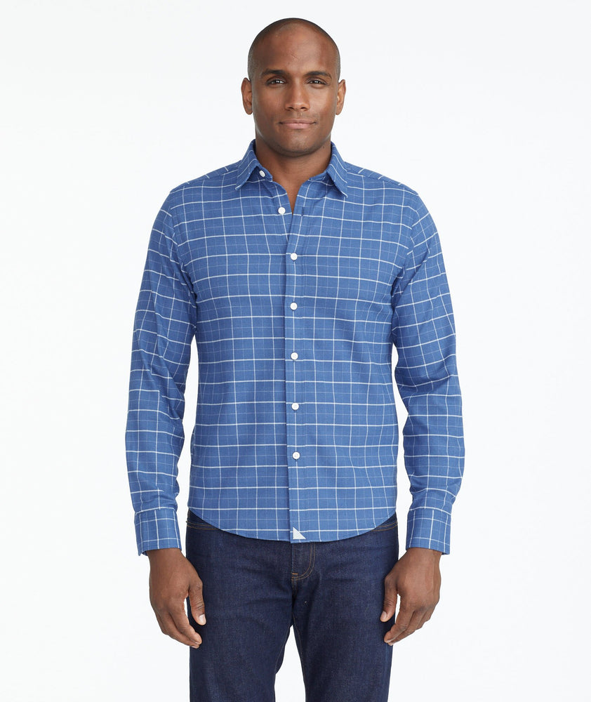Model wearing a Blue Wrinkle-Free Performance Flannel Shirt