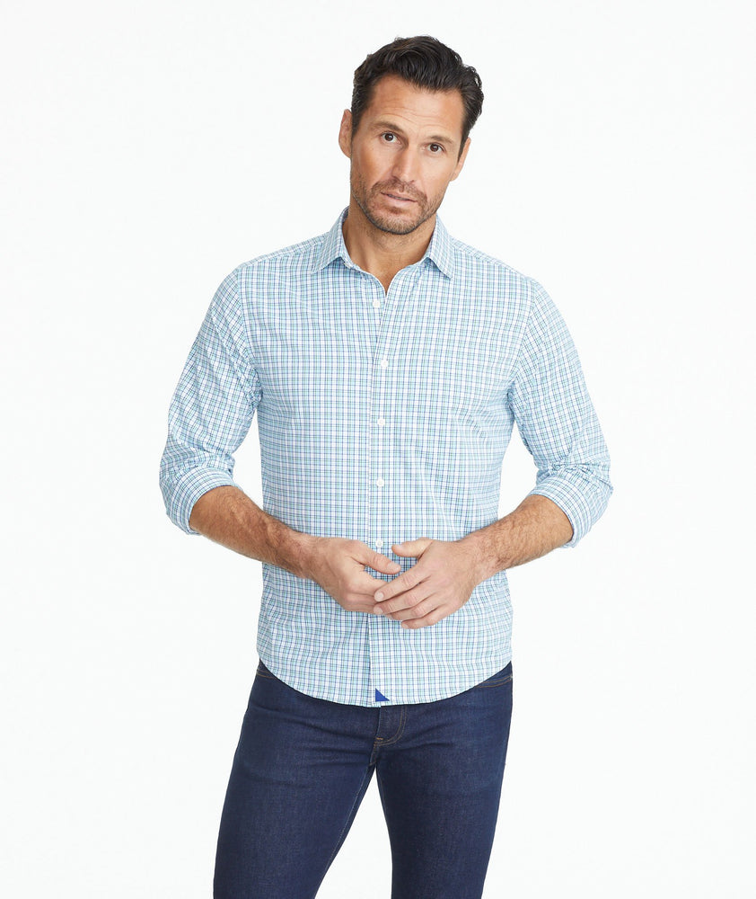 Model wearing a Blue Wrinkle-Free Performance Torciano Shirt