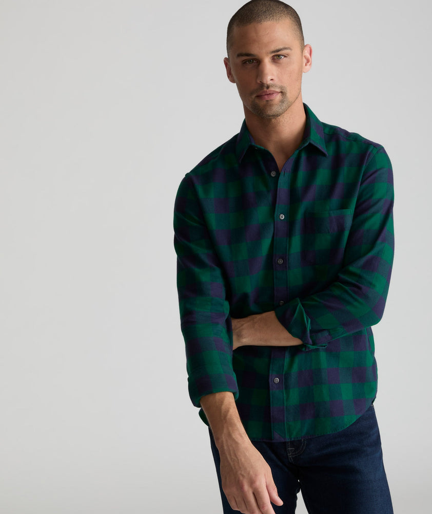 Model is wearing UNTUCKit Flannel Barrelstone Shirt in Blue & Green Check.