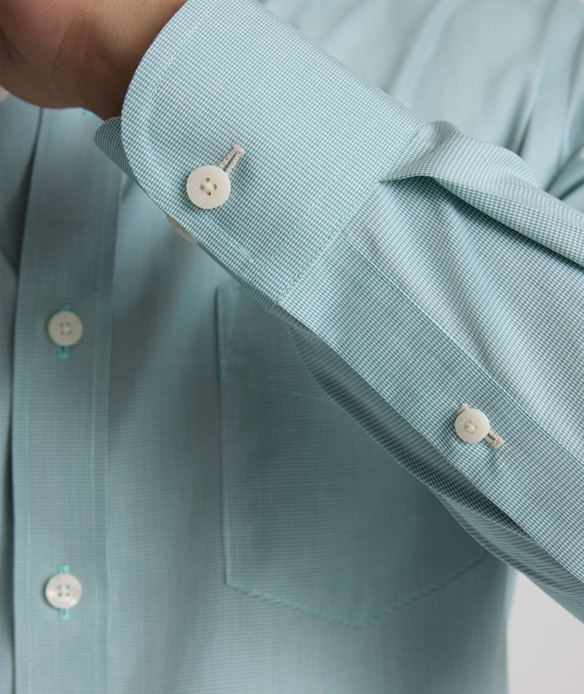 Model is wearing UNTUCKit Wrinkle-Free Cadetto Shirt in Light Green.