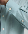 Model is wearing UNTUCKit Wrinkle-Free Cadetto Shirt in Light Green.