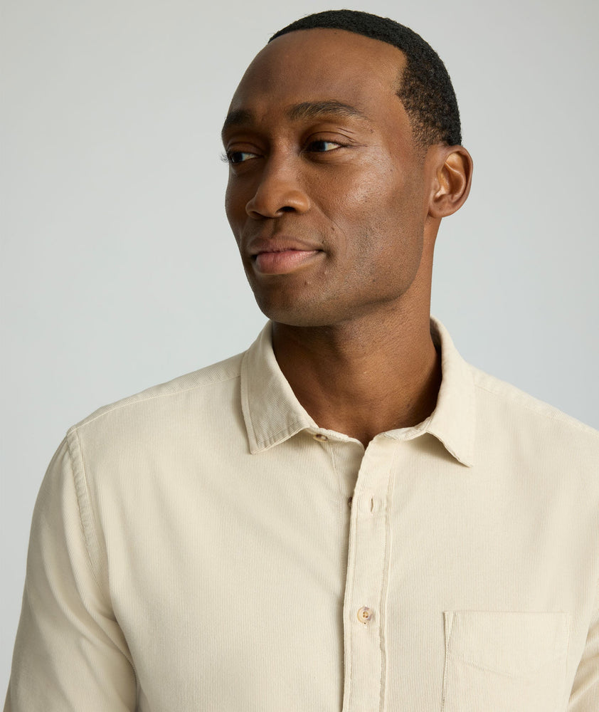Model is wearing UNTUCKit Cord Shirt in fog. 
