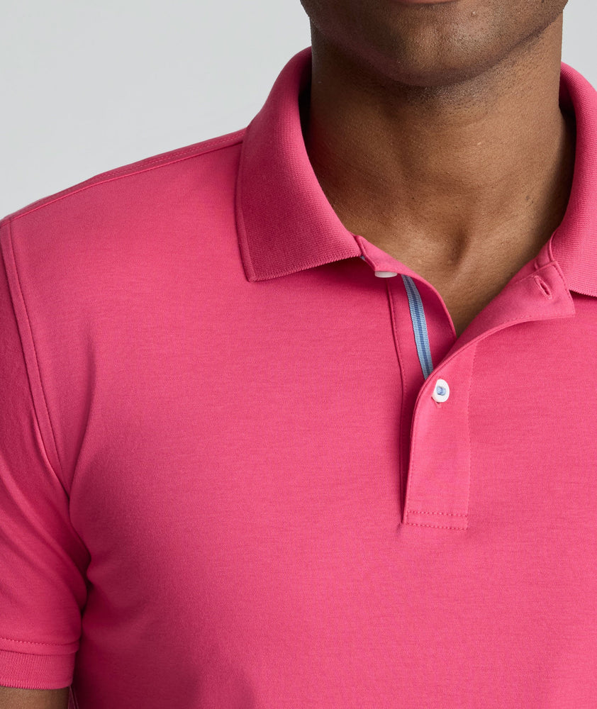 Model is wearing UNTUCKit Wrinkle-Free Damaschino Polo in Magenta.