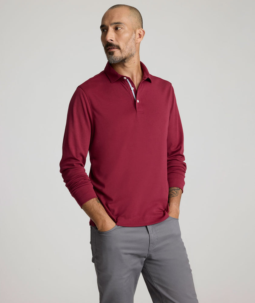 Model is wearing UNTUCKit Long Sleeve Damaschino in Rhododendron Red.