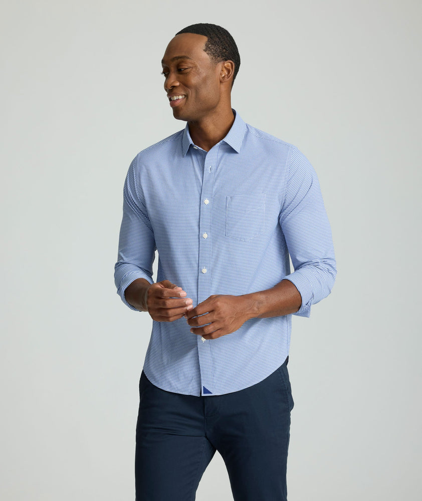 Model is wearing UNTUCKit Lafior Performance Shirt with Pocket. 