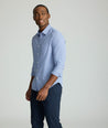 Model is wearing UNTUCKit Lafior Performance Shirt with Pocket. 