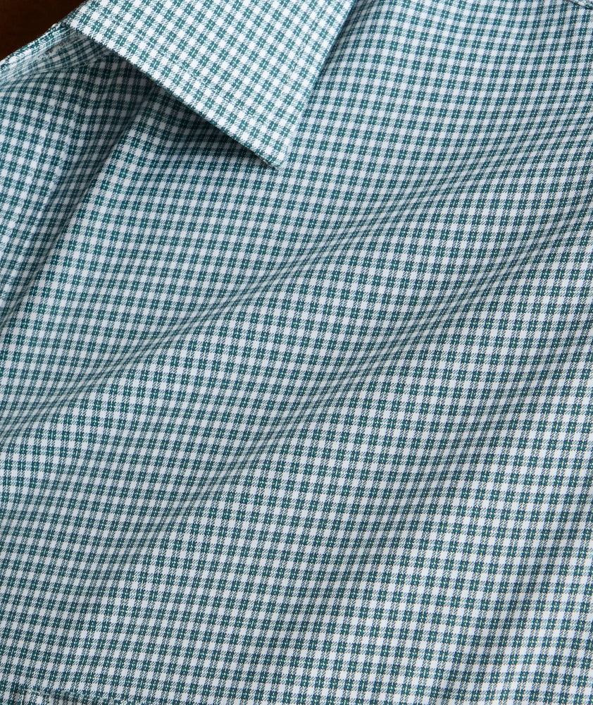 Model is wearing UNTUCKit Lafior Performance Shirt with Pocket. 