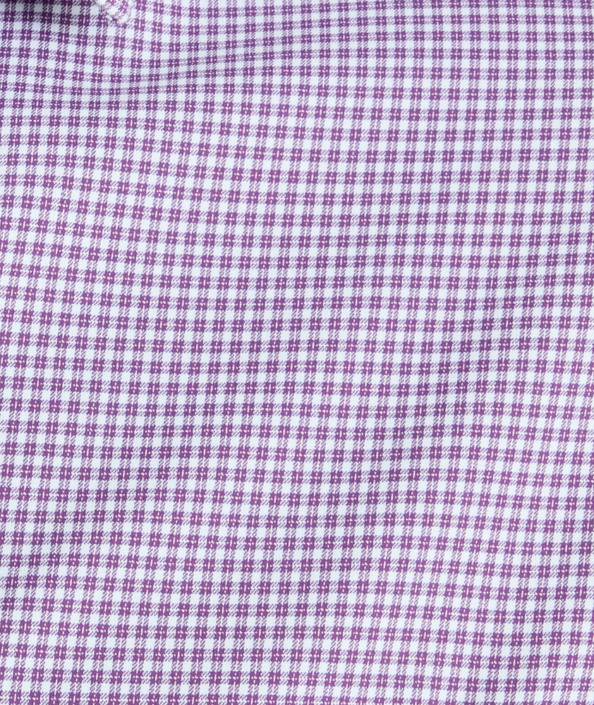 Model is wearing UNTUCKit Lafior Performance Shirt with Pocket. 