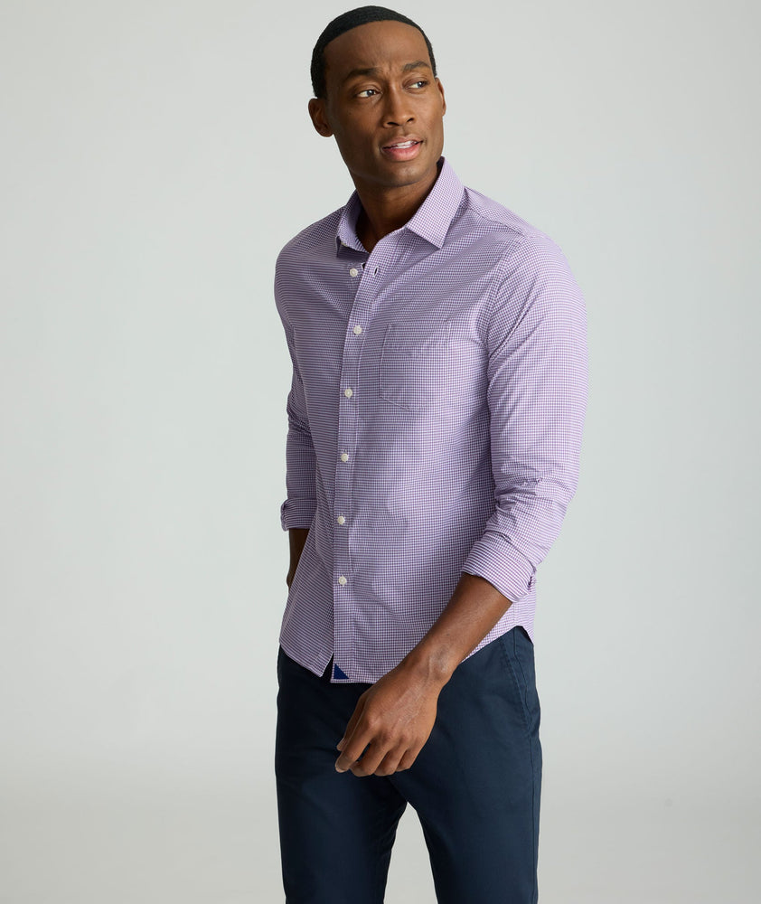 Model is wearing UNTUCKit Lafior Performance Shirt with Pocket. 