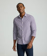 Model is wearing UNTUCKit Wrinkle-Free Lawrence Shirt in blackberry. 