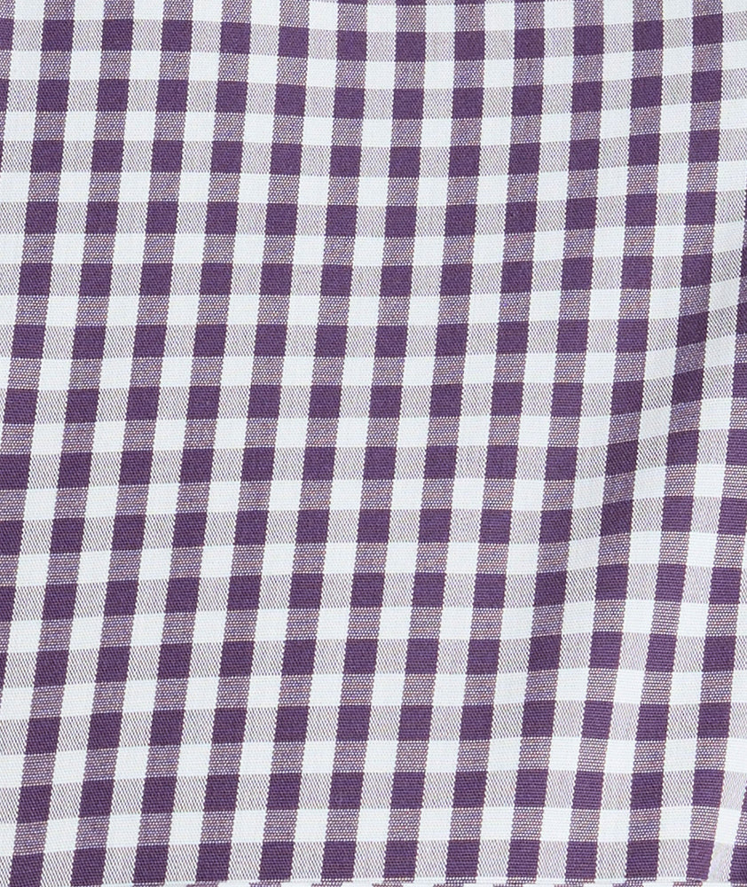 Model is wearing UNTUCKit Wrinkle-Free Lawrence Shirt in blackberry. 