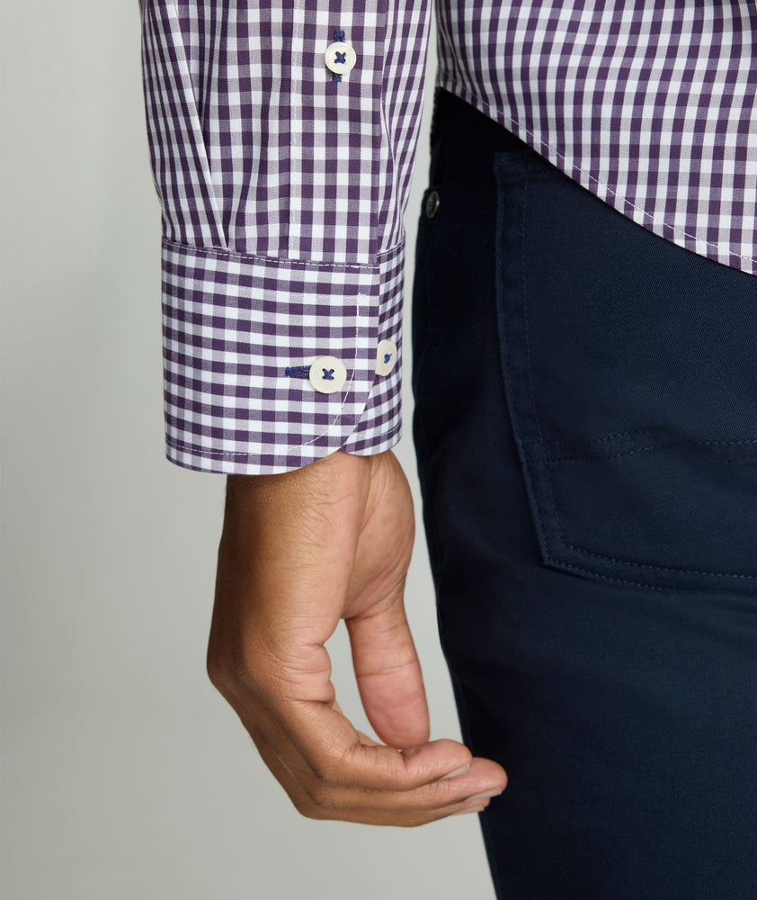 Model is wearing UNTUCKit Wrinkle-Free Lawrence Shirt in blackberry. 