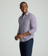 Model is wearing UNTUCKit Wrinkle-Free Lawrence Shirt in blackberry. 