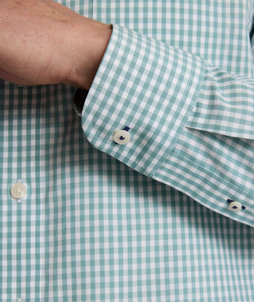 Model is wearing UNTUCKit Lawrence wrinkle-free shirt. 