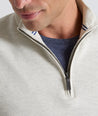 Model is wearing UNTUCKit Newbury cotton quarter zip in heather dove.