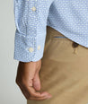 Model is wearing UNTUCKit Performance Shirt with Pocket in Blue Circle Print.