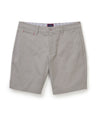 Model is wearing UNTUCKit 9"inch chino short in gray. 