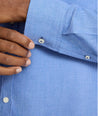 Model is wearing UNTUCKit Wrinkle-Free Veneto Shirt in light blue.