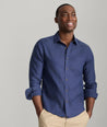 Model wearing an UNTUCKit Navy Wrinkle-Resistant Linen Vin Santo Shirt