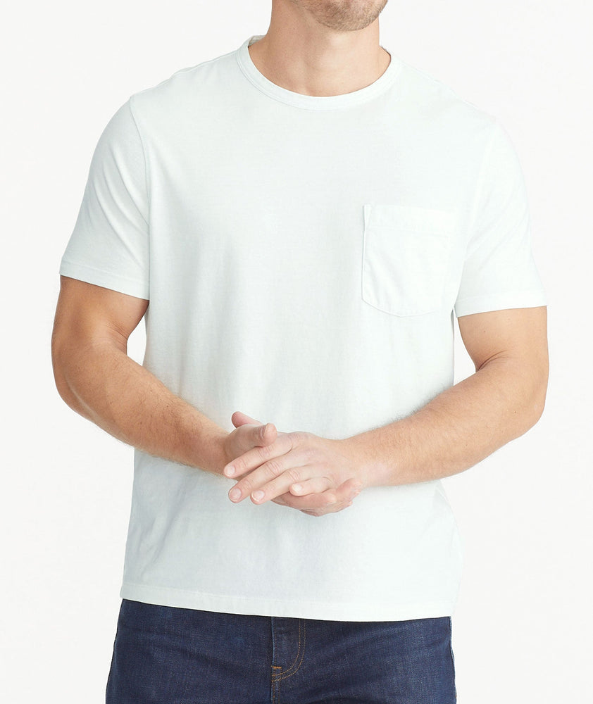 Model wearing an UNTUCKit Light Blue Mineral Dye Pocket Tee