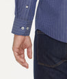 Model is wearing UNTUCKit Wrinkle-Free Gifford Shirt in Blue & White Stripe.