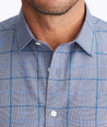Model wearing a Navy Wrinkle-Free Ortman Shirt