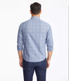 Model wearing a Navy Wrinkle-Free Ortman Shirt