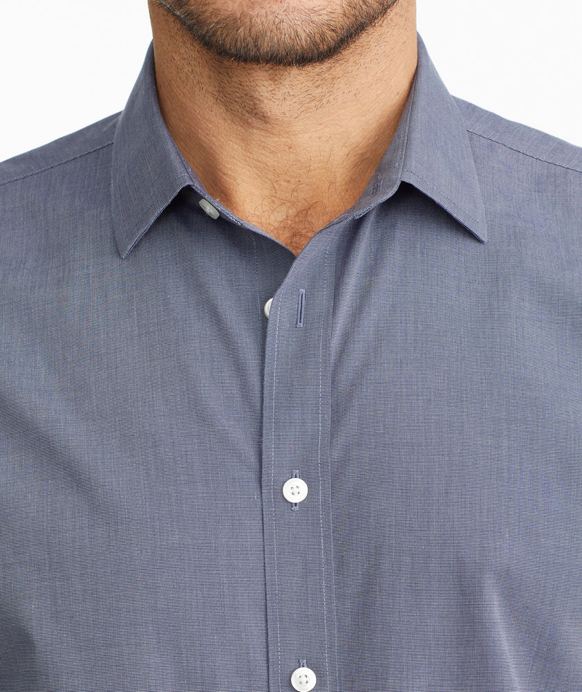 Model wearing a Blue Wrinkle-Free Orville Shirt