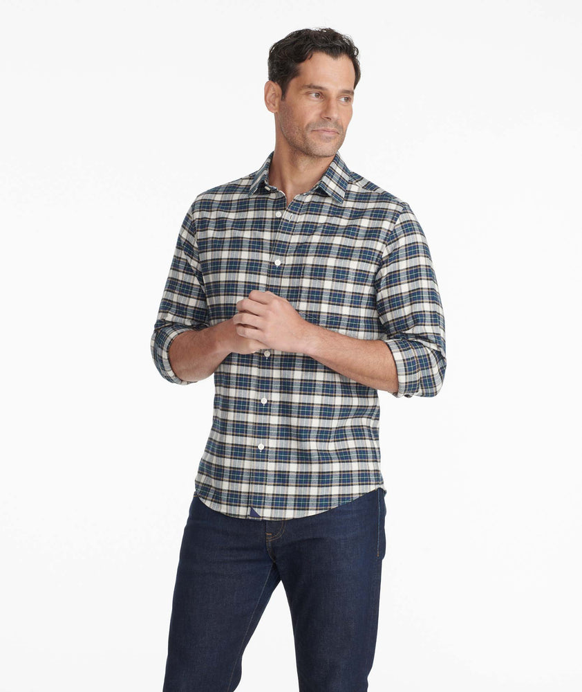 Model wearing a Green Flannel Rogan Shirt