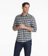 Model wearing a Green Flannel Rogan Shirt